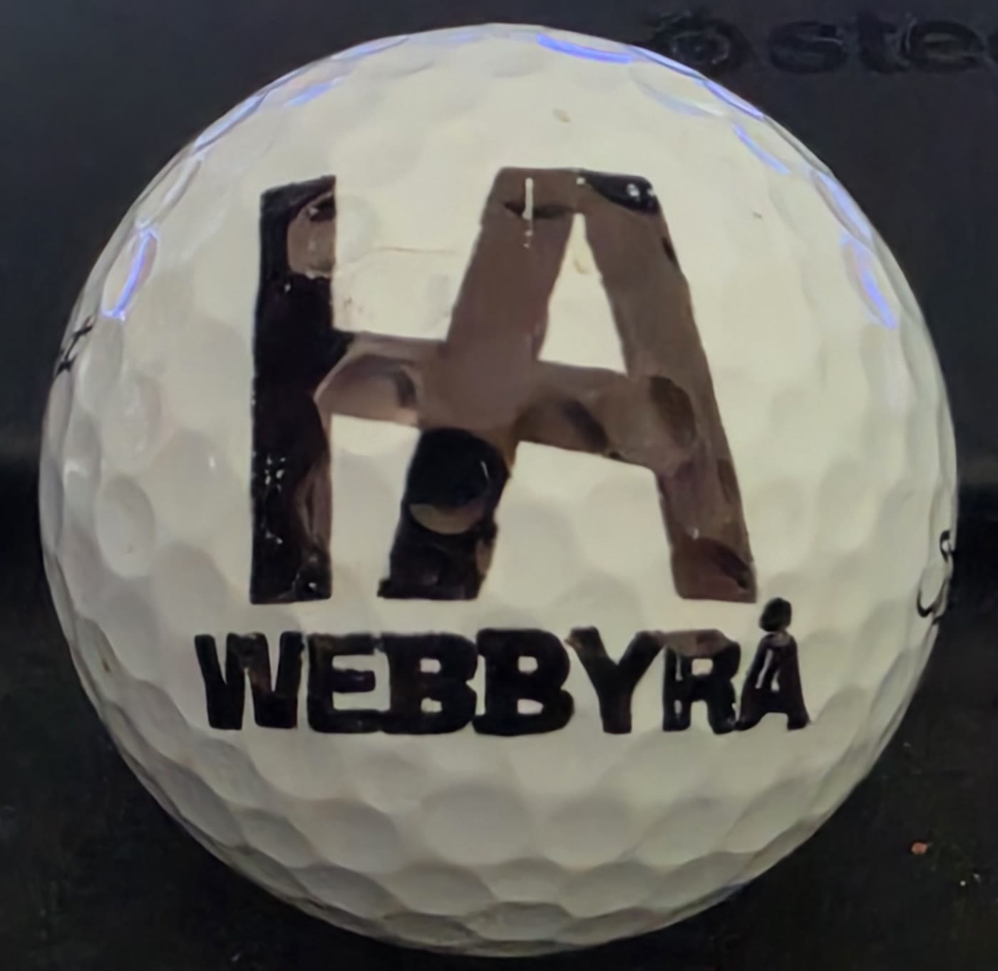 The golf ball plotter drawing on a mounted ball during a later test run